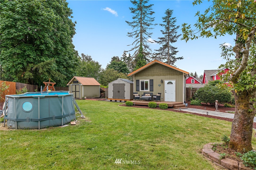 105 Ribelin Road Chehalis, WA 98532 - Photo 23 of 27 a front view of a house with a yard and trees