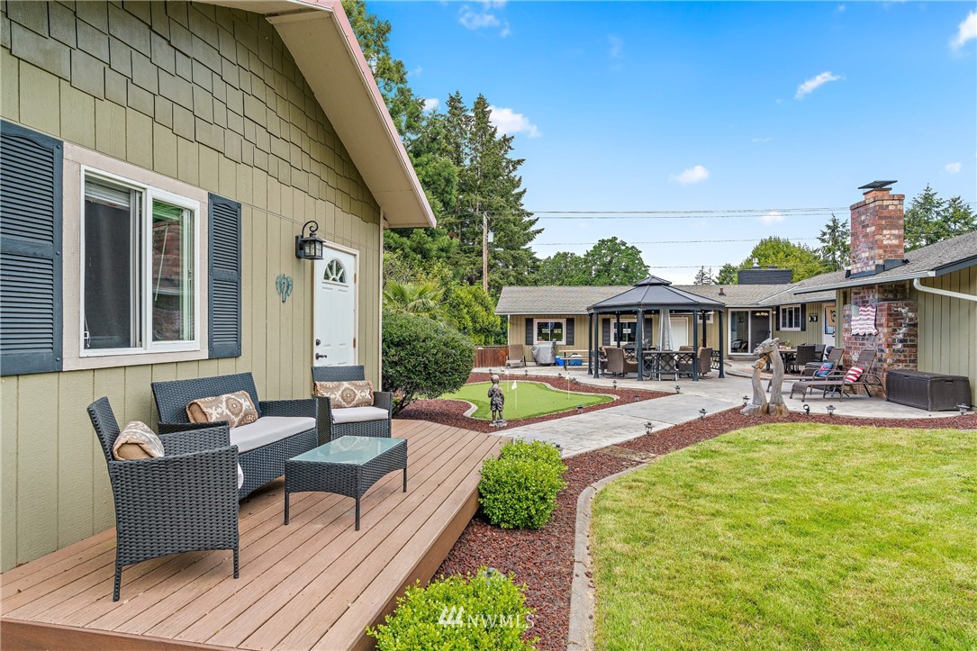 105 Ribelin Road Chehalis, WA 98532 - Photo 25 of 27 a front view of a house with garden and sitting area