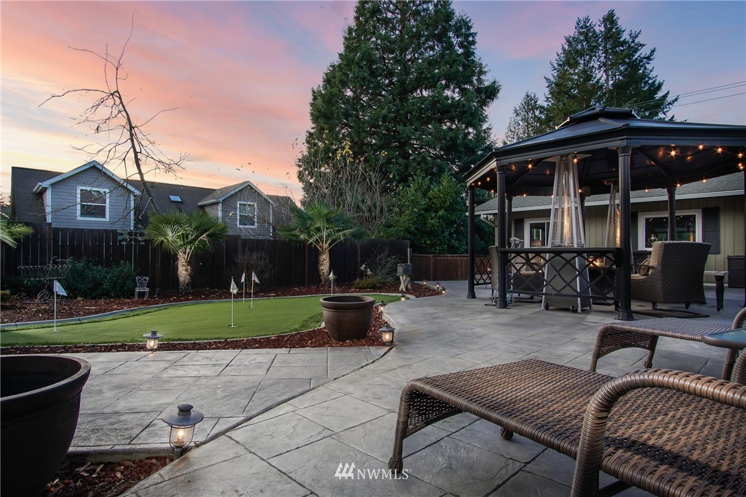 105 Ribelin Road Chehalis, WA 98532 - Photo 27 of 27 a view of a house with backyard sitting area and garden
