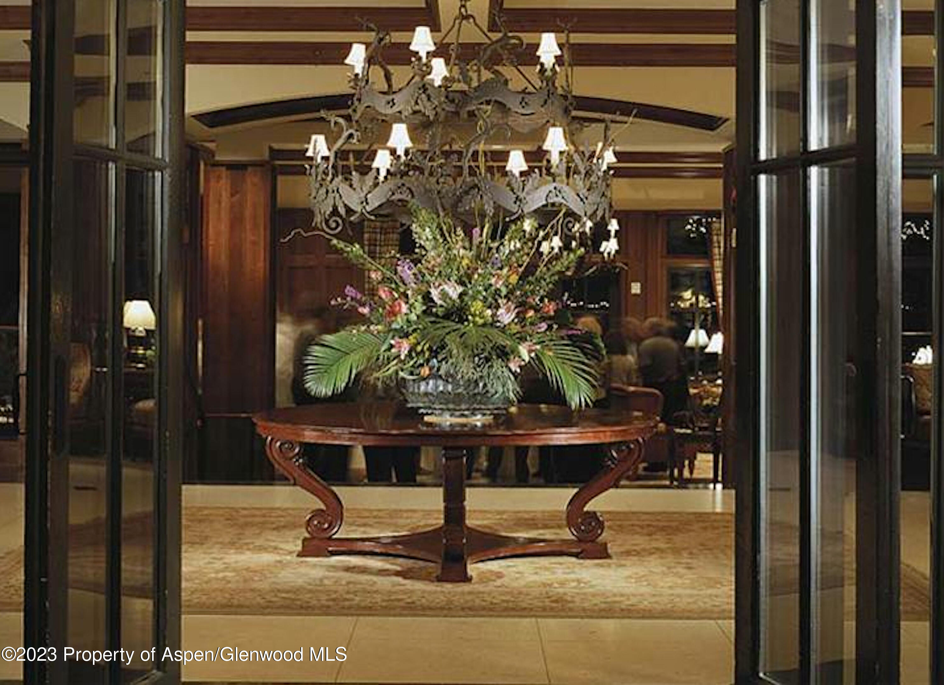 75 Prospector Road, Unit 840610 Aspen, CO 81611 - Photo 18 of 29 a vase of flowers sitting on a table