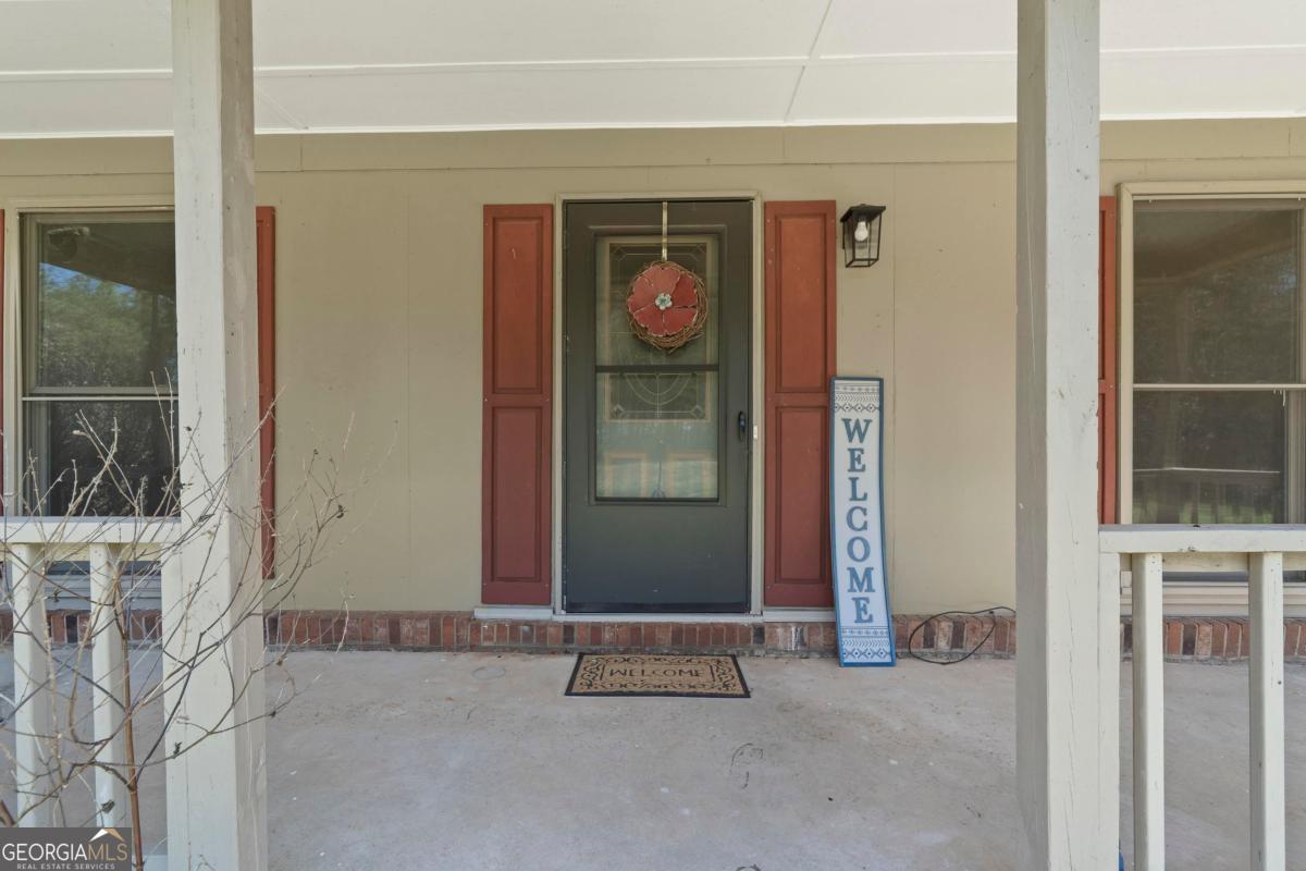 3021 Penfield Road Greensboro, GA 30642 - Photo 11 of 50 a view of an entrance to house
