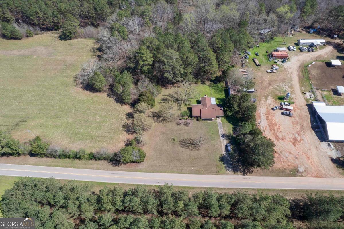3021 Penfield Road Greensboro, GA 30642 - Photo 41 of 50 an aerial view of a house with a yard