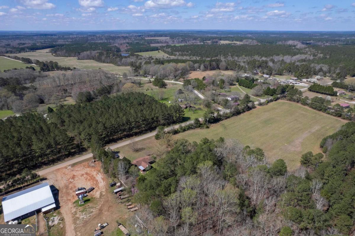 3021 Penfield Road Greensboro, GA 30642 - Photo 46 of 50 an aerial view of a house with a yard