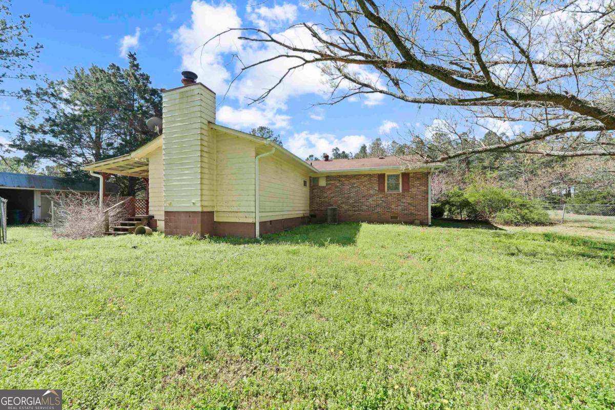 3021 Penfield Road Greensboro, GA 30642 - Photo 6 of 50 a view of a yard in front of house