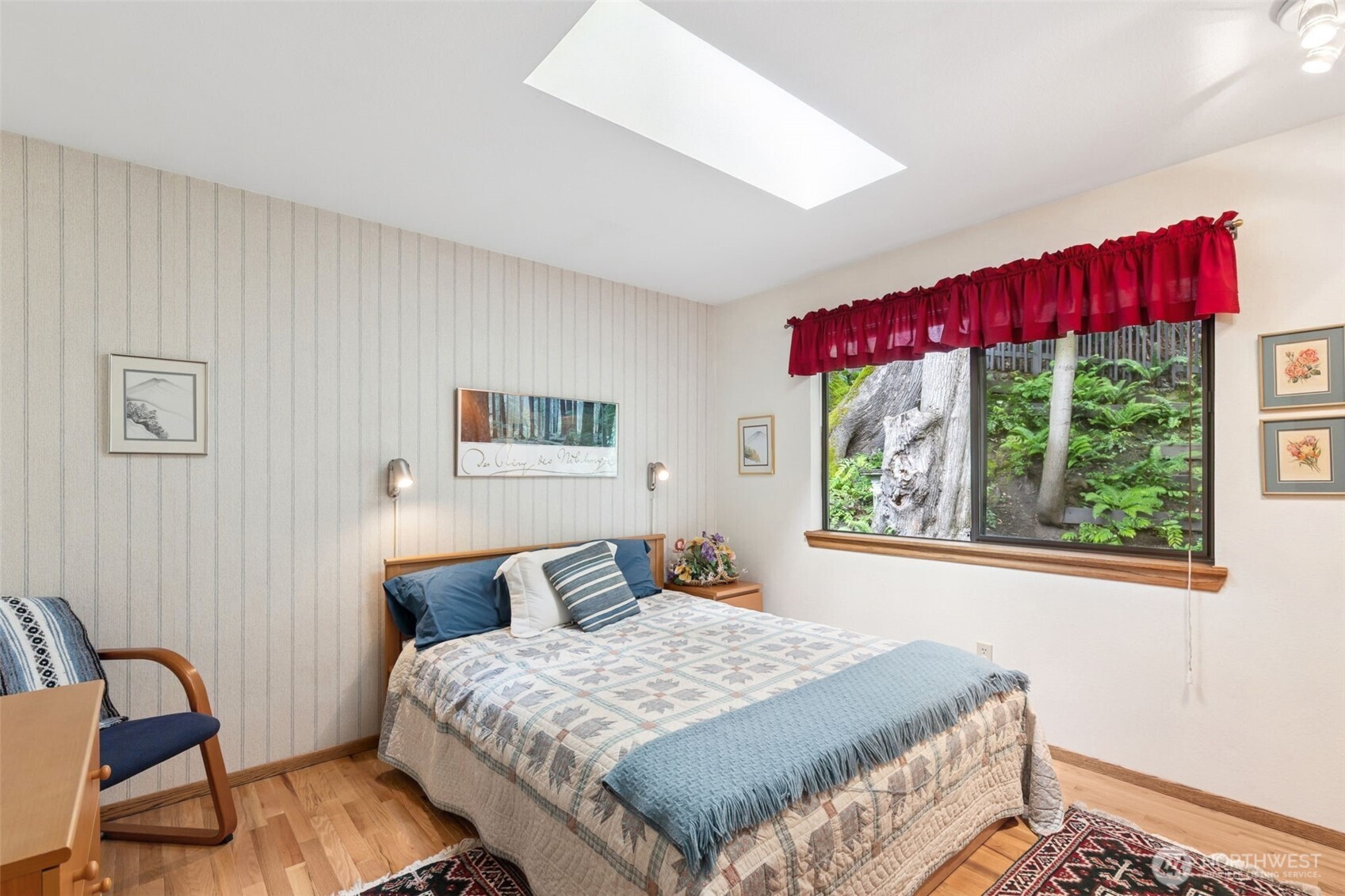 5019 East Mercer Way Mercer Island, WA 98040 - Photo 15 of 31 a bedroom with a bed and a dresser next to a window