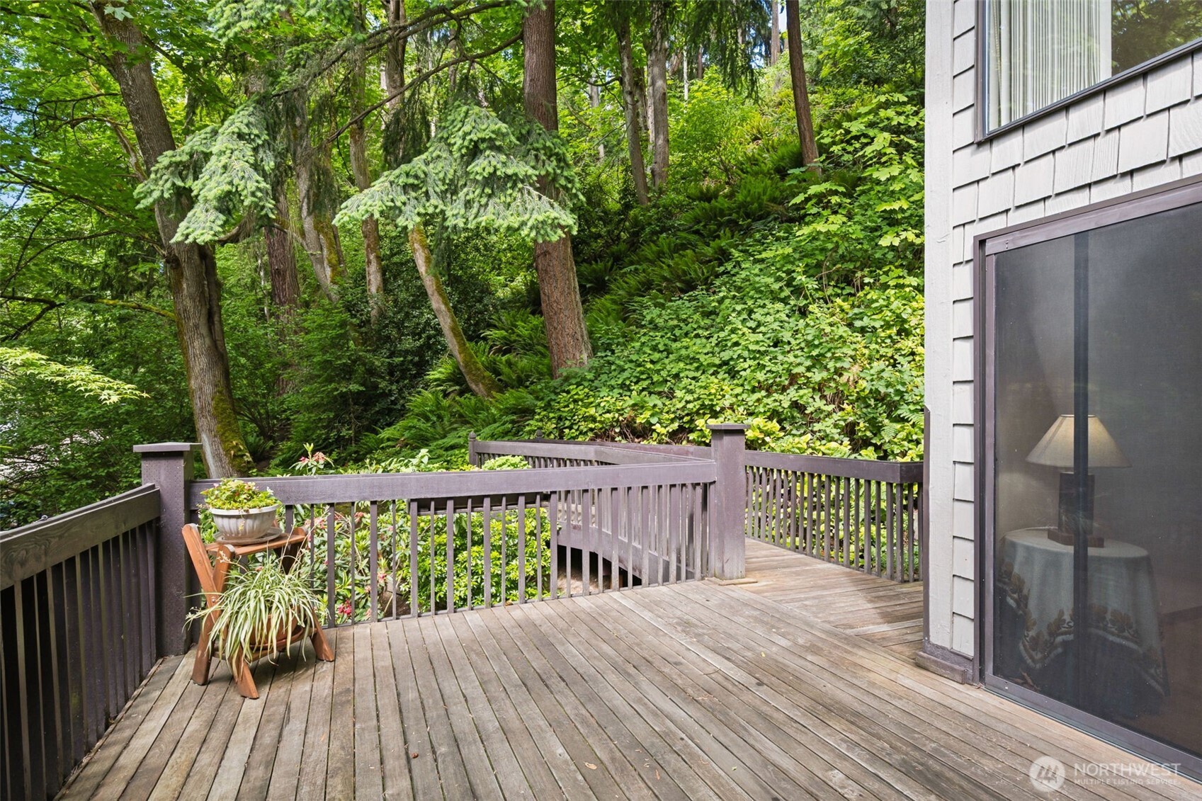 5019 East Mercer Way Mercer Island, WA 98040 - Photo 27 of 31 a view of a wooden deck with a trees