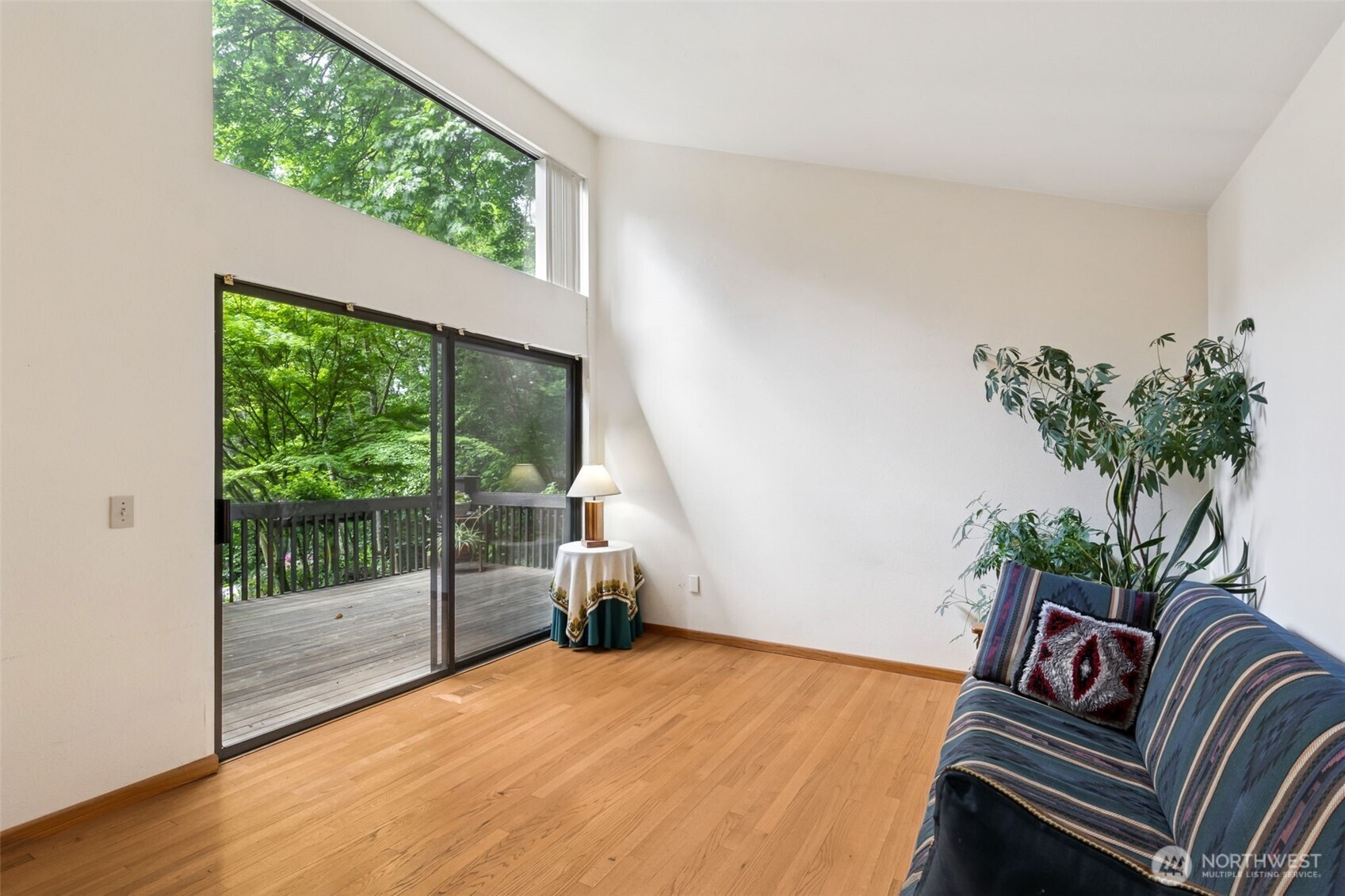 5019 East Mercer Way Mercer Island, WA 98040 - Photo 5 of 31 a living room with furniture and a potted plant