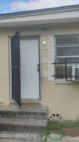 a bathroom with a toilet and a sink