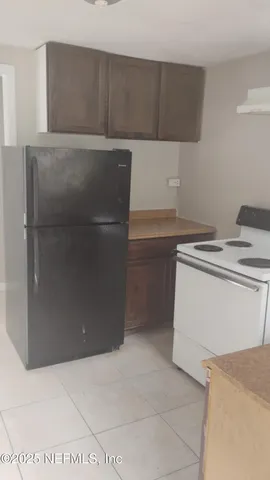 a utility room with washer and dryer