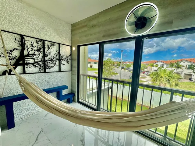 a view of swimming pool from a balcony