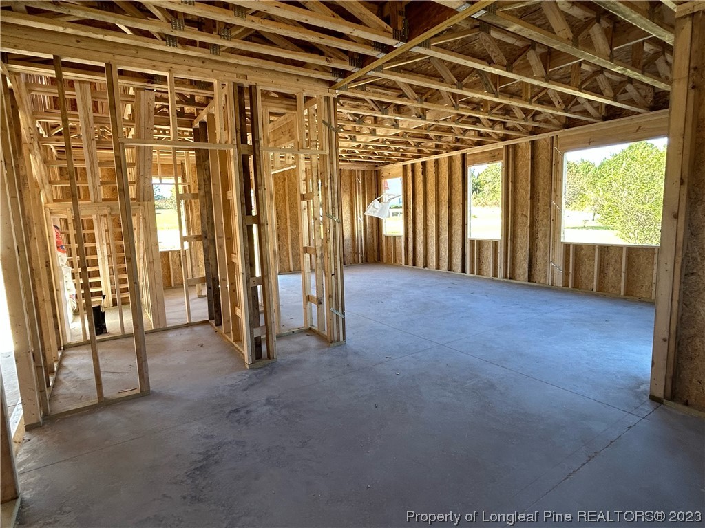 325 Ray Byrd Road Lillington, NC 27546 - Photo 13 of 23 a view of an empty room with windows