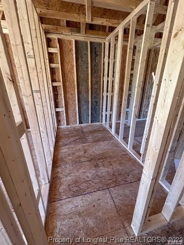 325 Ray Byrd Road Lillington, NC 27546 - Photo 21 of 23 a view of a closet with wooden floor