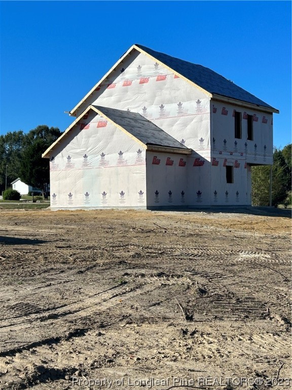 325 Ray Byrd Road Lillington, NC 27546 - Photo 5 of 23 a view of a house with a yard