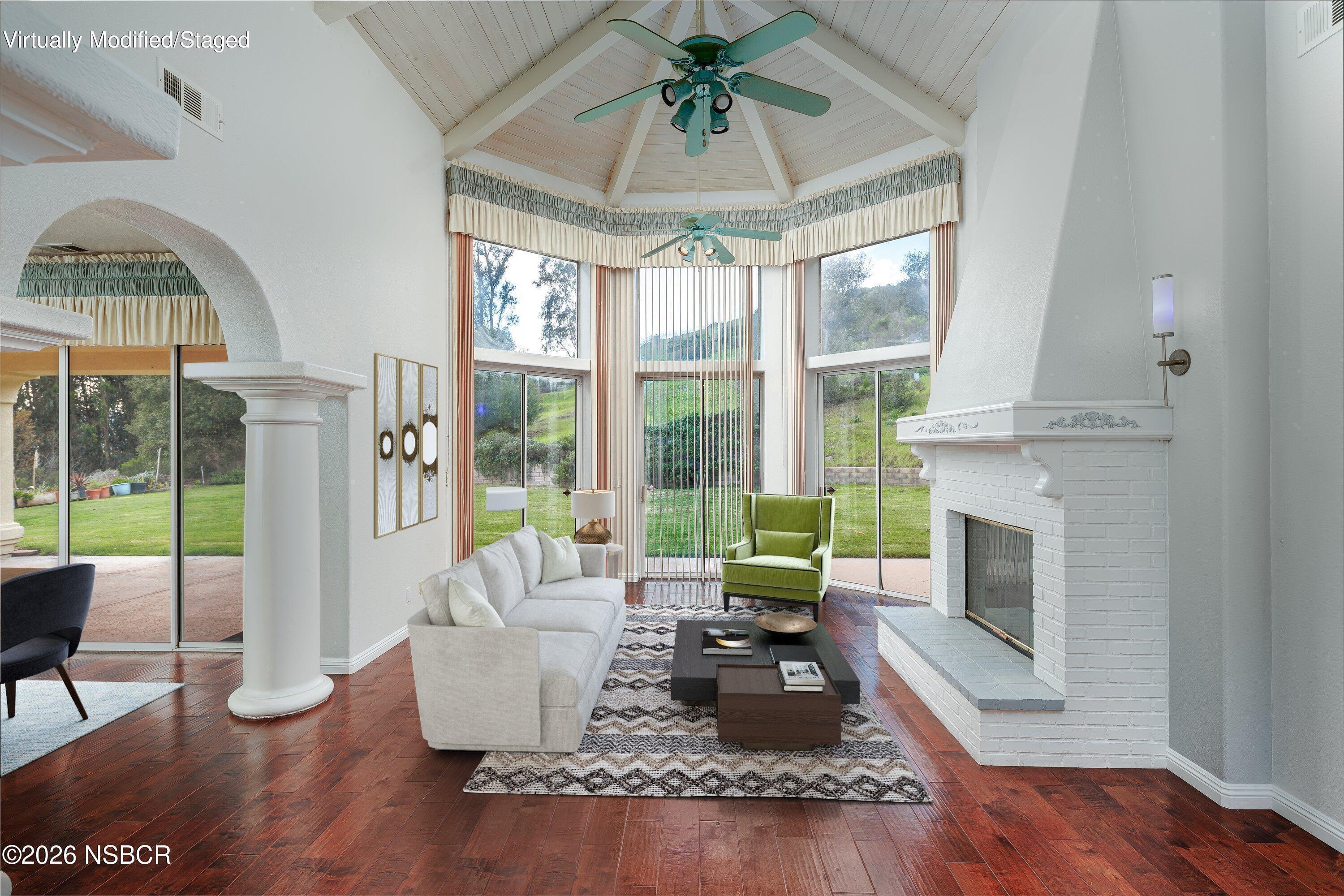 2655 Adobe Falls Road Lompoc, CA 93436 - Photo 11 of 51 a living room with fireplace furniture and a large window