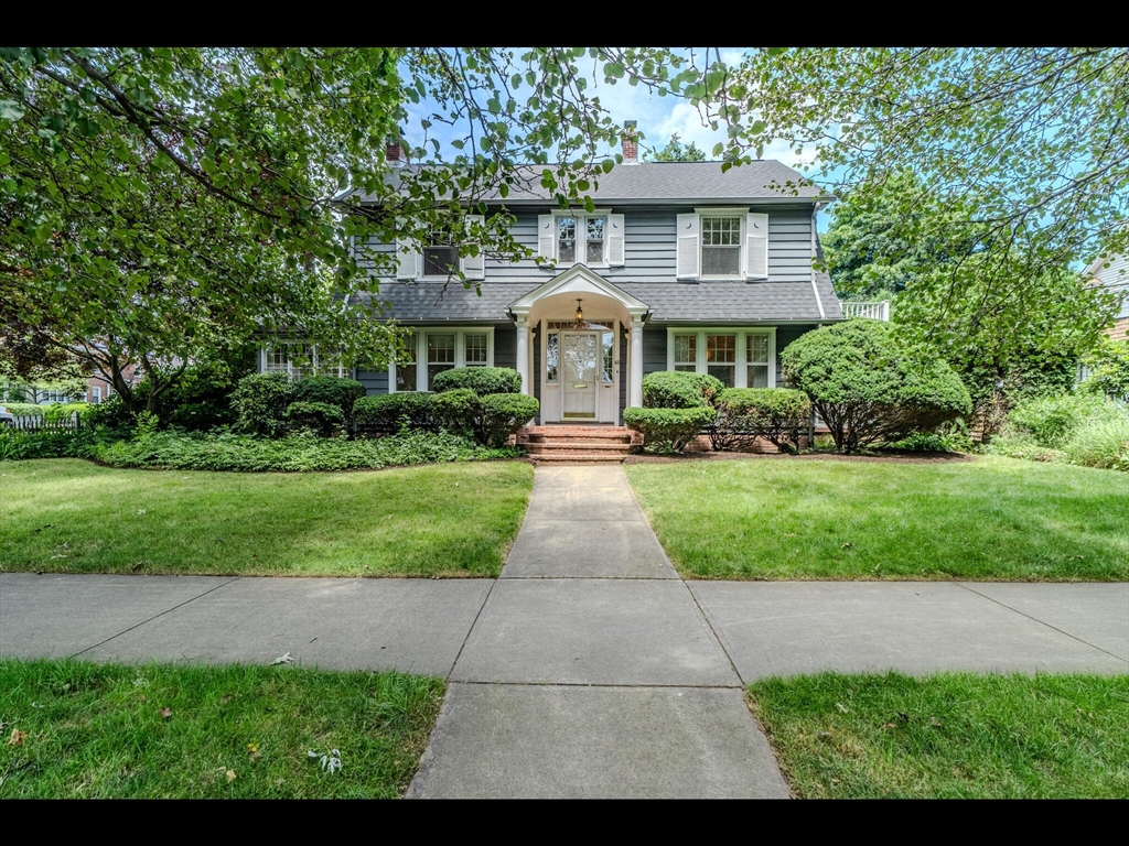 48 Hillcrest Avenue Longmeadow, MA 01106 - Photo 1 of 42 a front view of a house with yard and green space