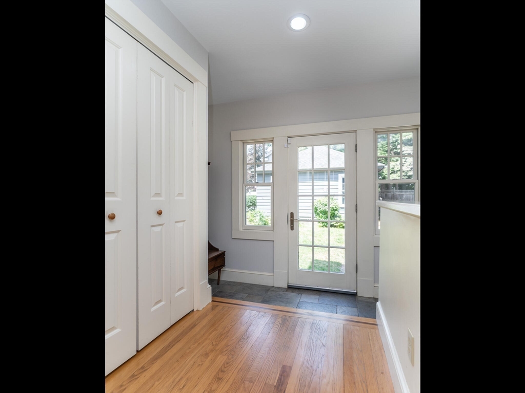 48 Hillcrest Avenue Longmeadow, MA 01106 - Photo 13 of 42 a view of hallway with wooden floor and fan