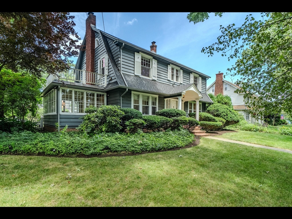 48 Hillcrest Avenue Longmeadow, MA 01106 - Photo 2 of 42 a front view of a house with a yard