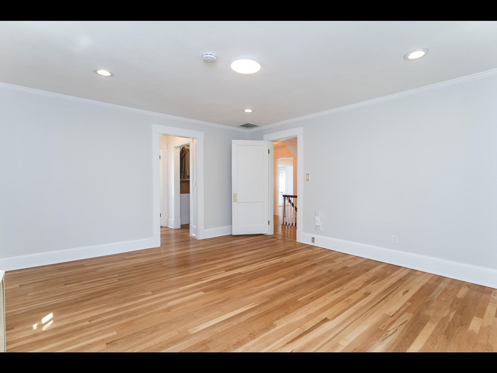 48 Hillcrest Avenue Longmeadow, MA 01106 - Photo 21 of 42 a view of an empty room with wooden floor