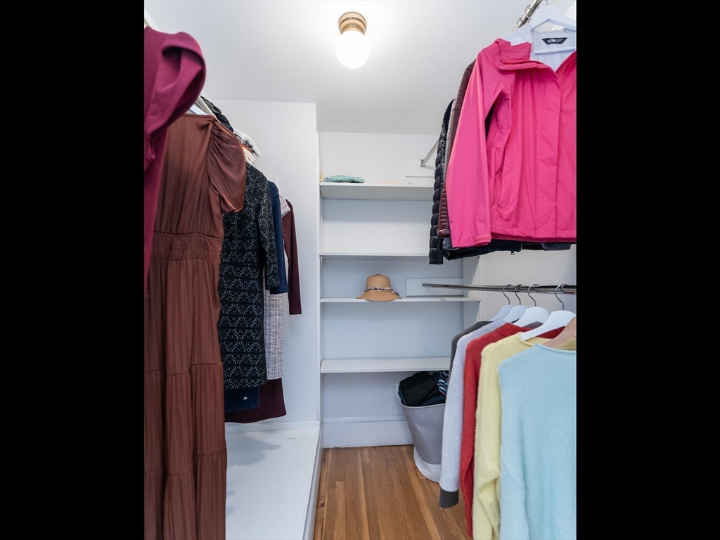 48 Hillcrest Avenue Longmeadow, MA 01106 - Photo 25 of 42 a view of walk in closet with clothes and shoes