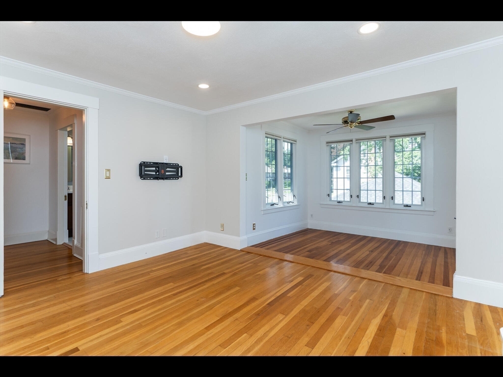 48 Hillcrest Avenue Longmeadow, MA 01106 - Photo 26 of 42 a view of an empty room with wooden floor and a window