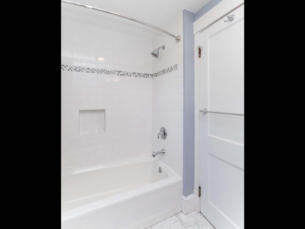 48 Hillcrest Avenue Longmeadow, MA 01106 - Photo 29 of 42 a bathroom with a bathtub and a shower