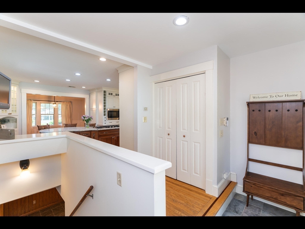 48 Hillcrest Avenue Longmeadow, MA 01106 - Photo 30 of 42 a view of a kitchen with wooden floor and a large window