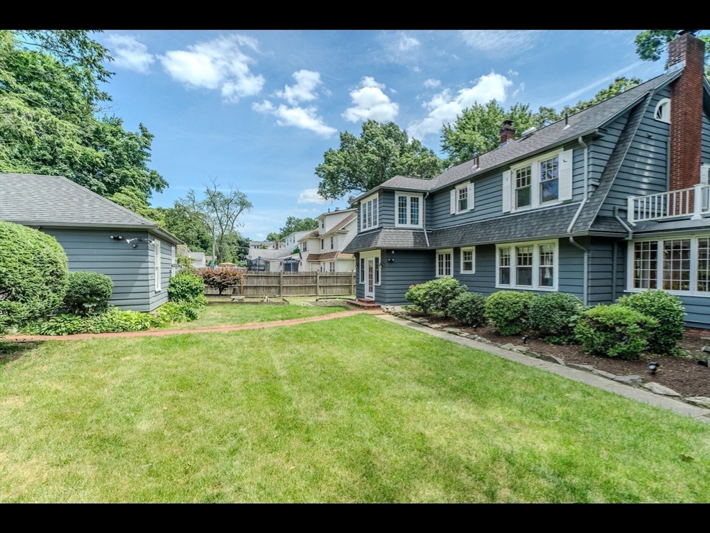 48 Hillcrest Avenue Longmeadow, MA 01106 - Photo 37 of 42 a front view of a house with a yard