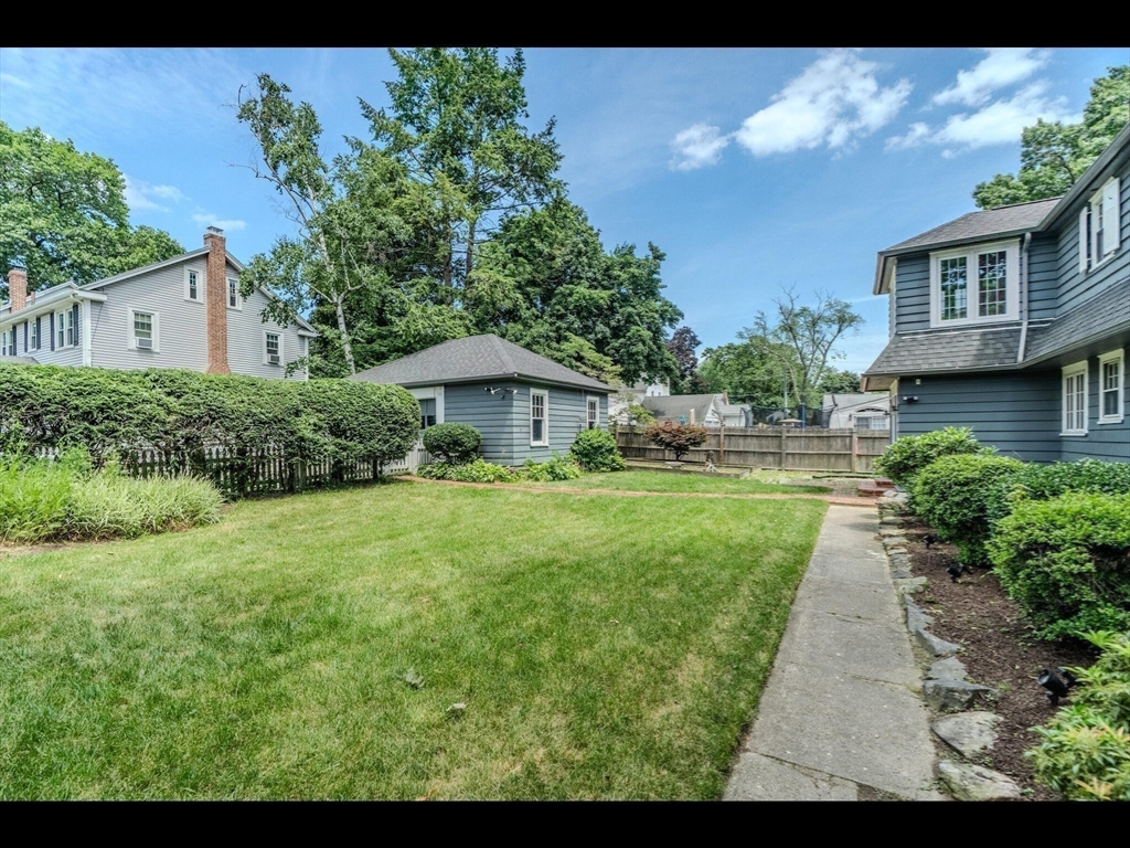 48 Hillcrest Avenue Longmeadow, MA 01106 - Photo 38 of 42 a front view of a house with garden