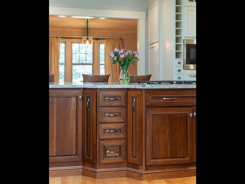 48 Hillcrest Avenue Longmeadow, MA 01106 - Photo 10 of 42 a bathroom with a granite countertop sink and a large mirror