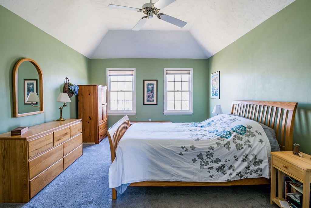 21 Russet Hill Road Ashland, MA 01721 - Photo 21 of 29 a bedroom with a bed and a dresser