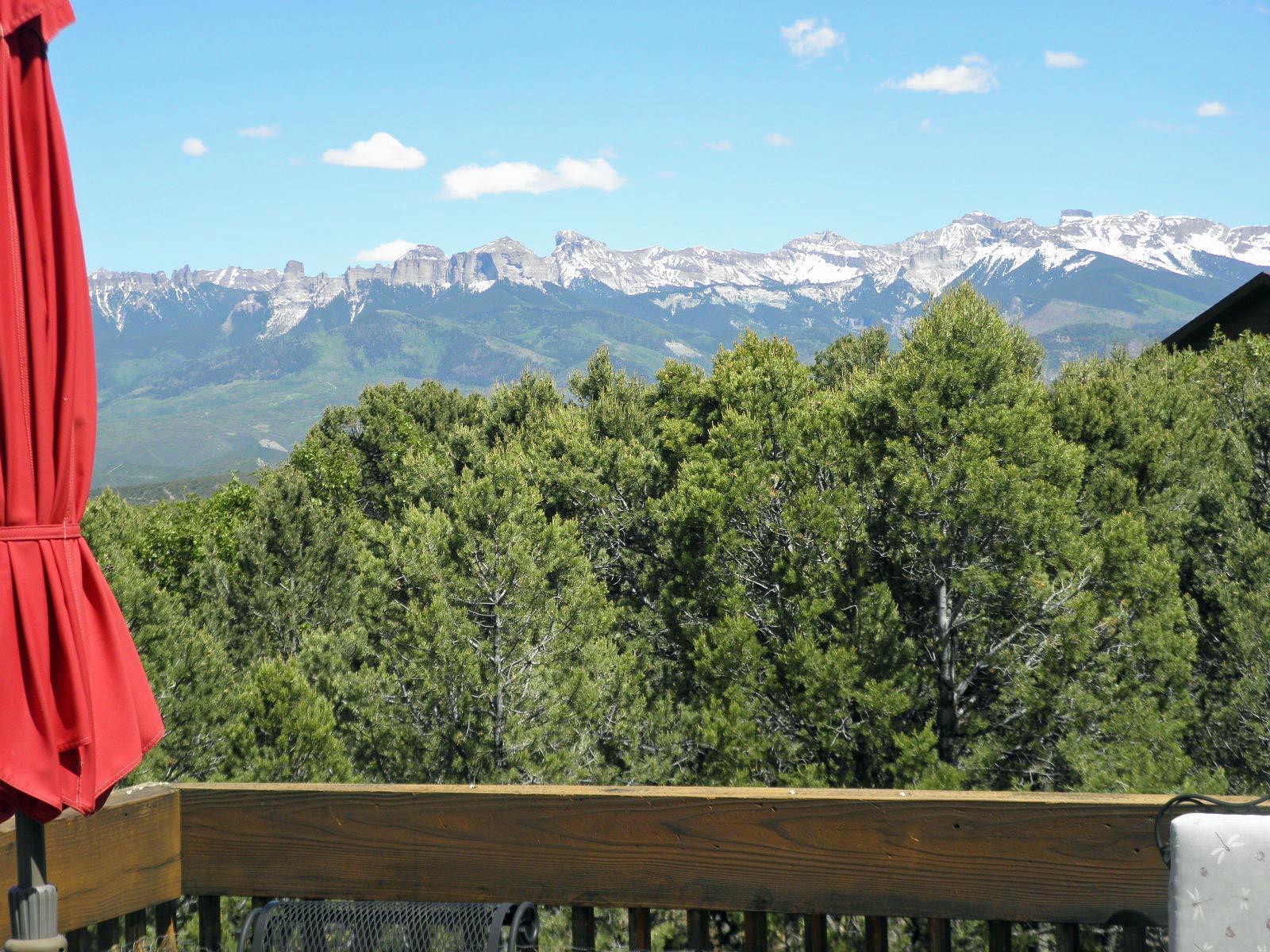 294 Juniper Road North Ridgway, CO 81432 - Photo 33 of 35 view of Cimarrons from deck slight zoom