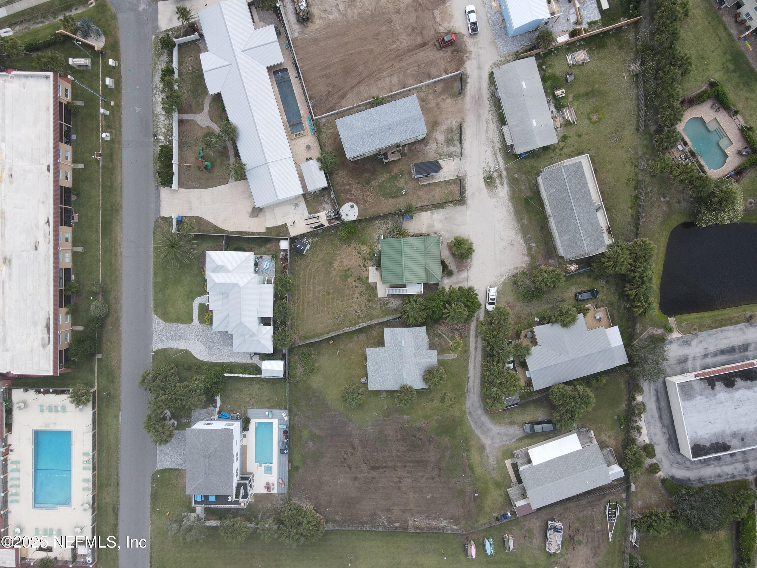 130 Gassett Road St. Augustine, FL 32080 - Photo 3 of 15 an aerial view of houses with outdoor space