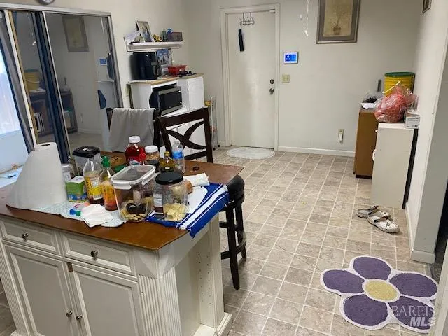 a room with furniture and a mirror