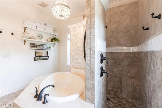 a bathroom with a sink a mirror and a shower