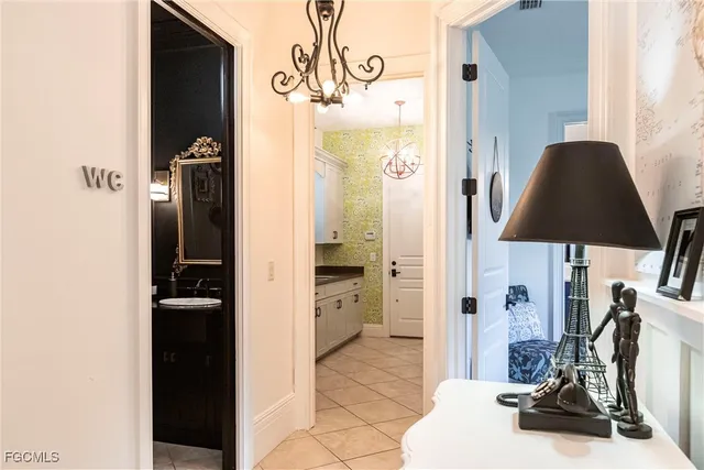 a view of a bathroom with a sink and a mirror