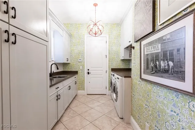 a kitchen with granite countertop a refrigerator and a stove