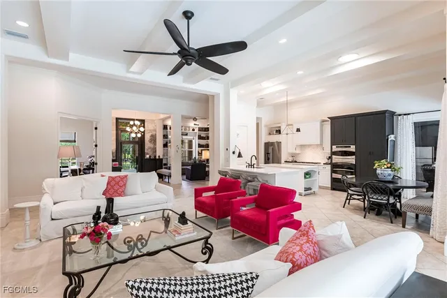 a living room with furniture or outdoor view and a large window