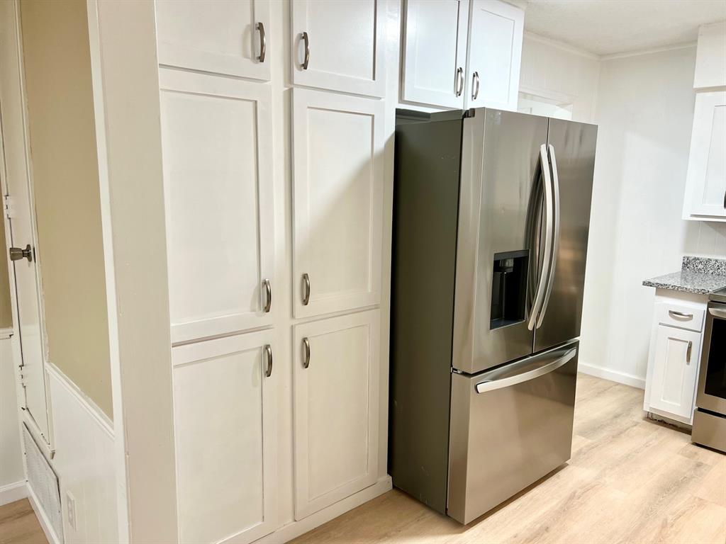 38 Valley View Circle Denison, TX 75021 - Photo 6 of 15 a metallic refrigerator freezer sitting in a kitchen