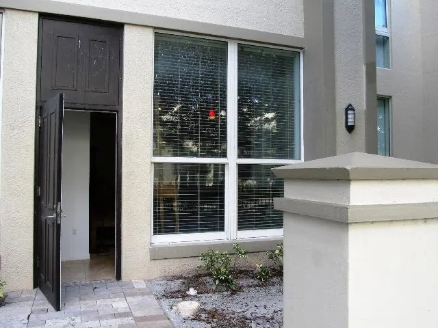 a view of entrance door of a house