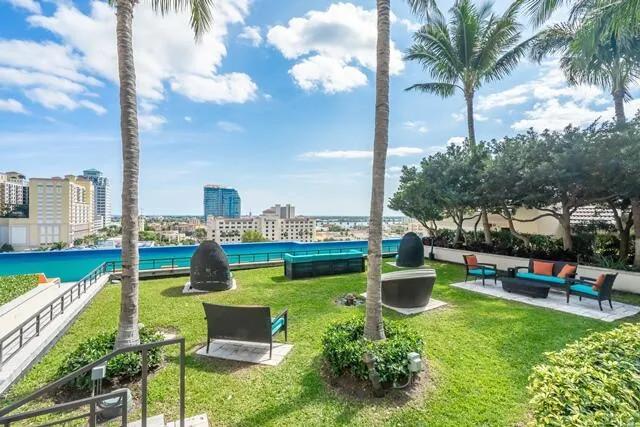 a view of a garden with swimming pool