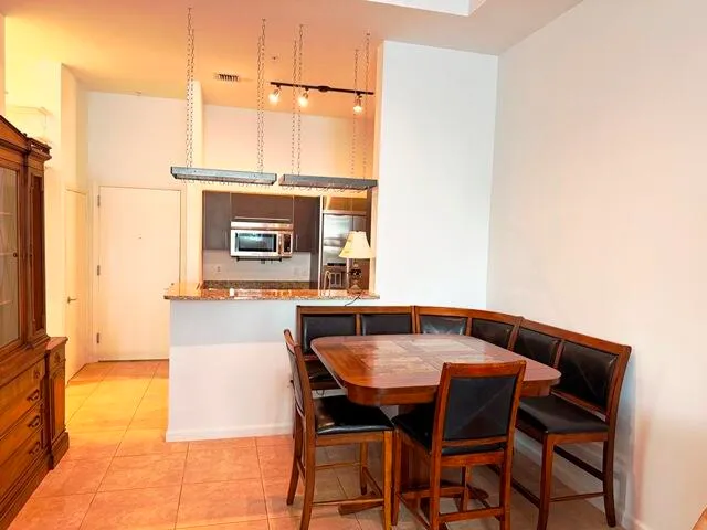 a dinning table and chairs in patio