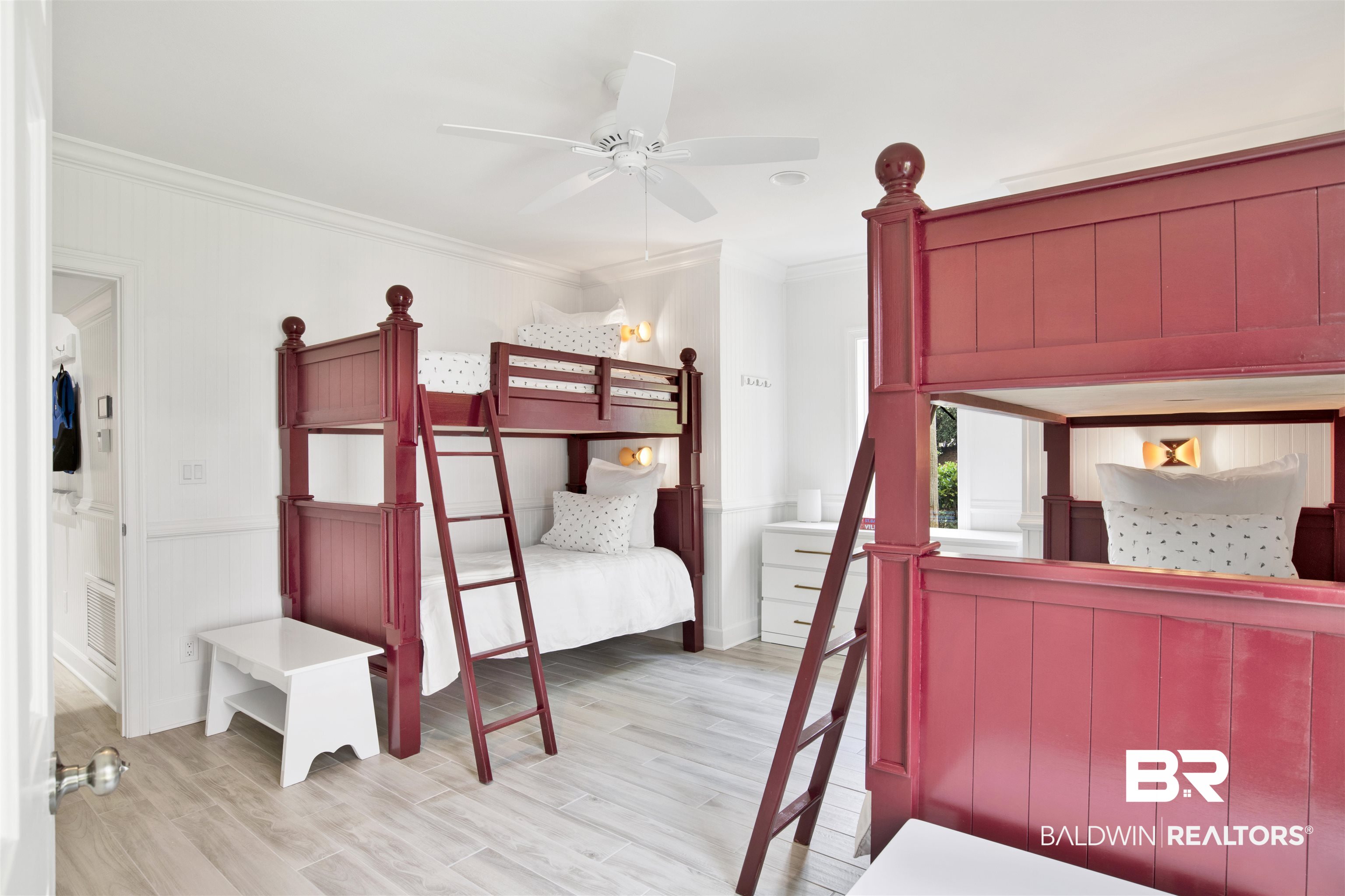 33400 River Road Orange Beach, AL 36561 - Photo 51 of 72 Bedroom featuring ornamental molding, light hardwood / wood-style flooring, and ceiling fan