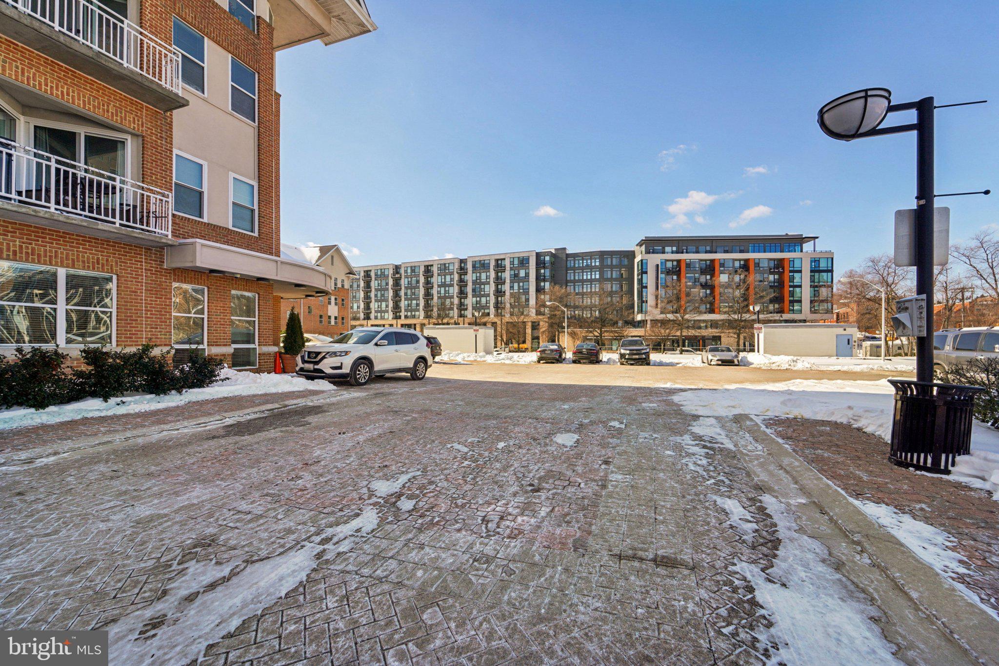 23 Pierside Drive, Unit 118 Baltimore, MD 21230 - Photo 25 of 32 a car parked on the side of the road