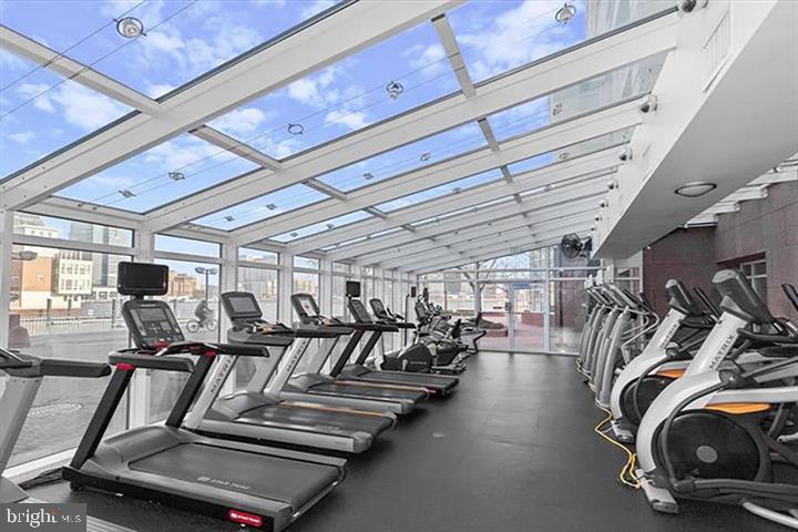 23 Pierside Drive, Unit 118 Baltimore, MD 21230 - Photo 31 of 32 a view of a room with gym equipment