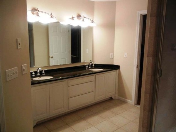 2 Fox Run Road Upton, MA 01568 - Photo 6 of 12 a bathroom with a double vanity sink and a mirror