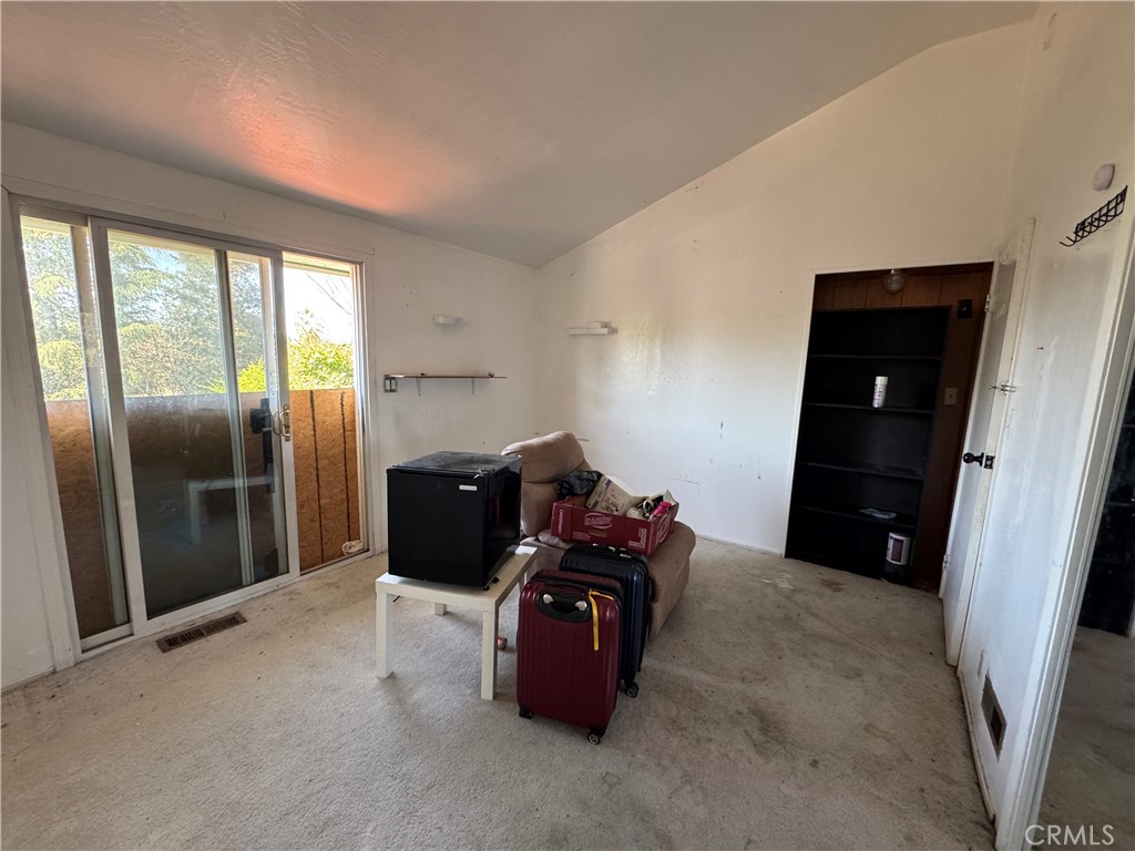 5248 Concord Boulevard Concord, CA 94521 - Photo 8 of 11 a living room with furniture and a air conditioner vent