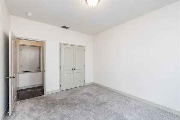 an empty room with closet