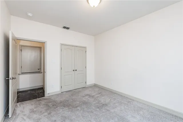 an empty room with closet