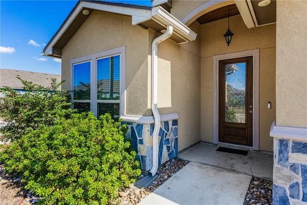 a front view of a house with a porch