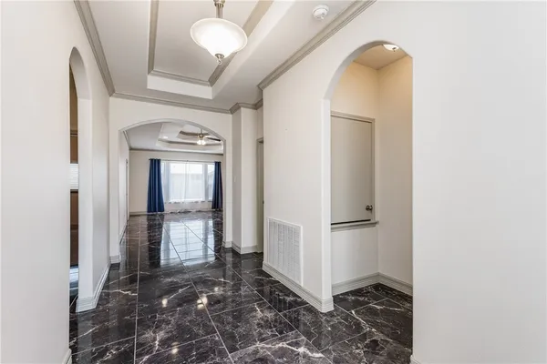 a view of an empty room and window